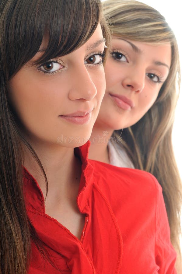 Two young girls isolated on white