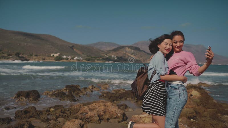 Two Young Lesbian Girls Taking Selfie at Seaside. Lgbt, Pride, Relationship, Friendship Concept. Stock Footage - Video of attractive, camera: 170127924