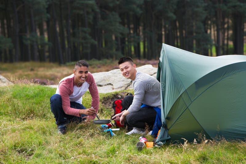 Two Young Men on Camping Trip in Countryside Stock Image Image of