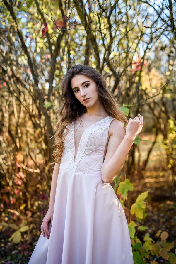 Two Young Princess Wearing Nice Beige Dress in Autumn Park. Fashion ...