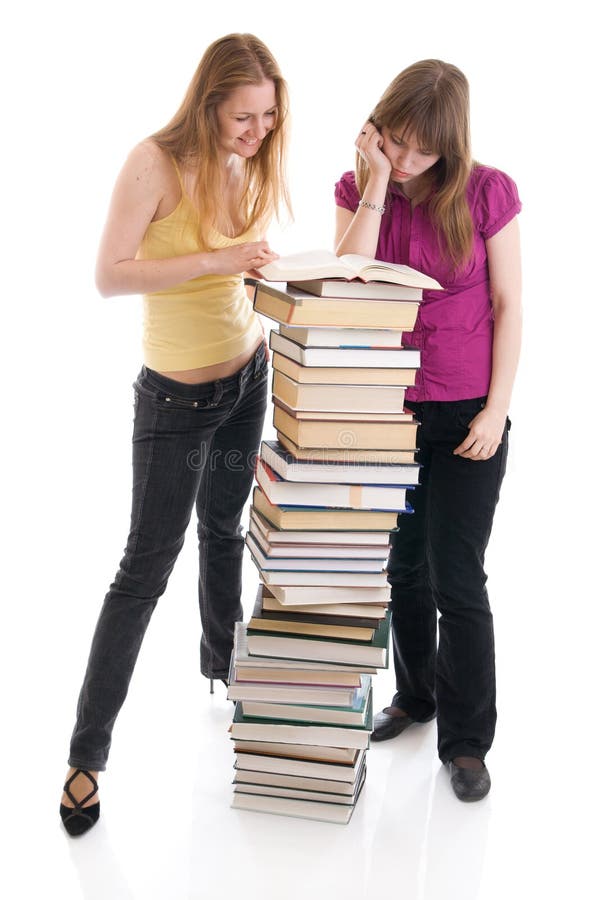 The two young students isolated on a white