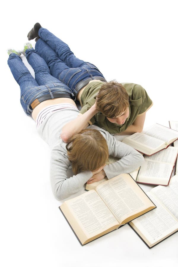 The two young students isolated on a white