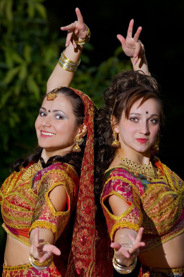 Two young woman dance - indian cloth