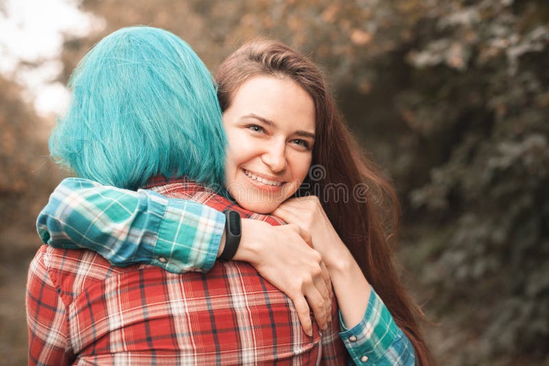 Two young women having fun in forest royalty free stock photo Two young women having fun in forest royalty free stock photo