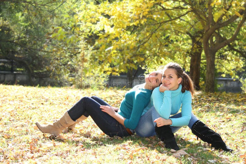 Two young women on natural background