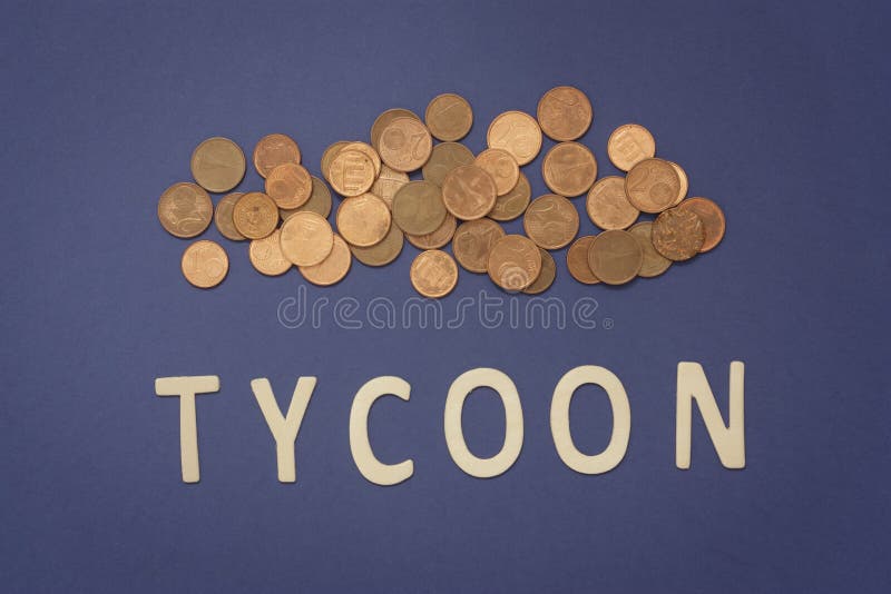 Tycoon Written with Wooden Letters on a Blue Background Stock