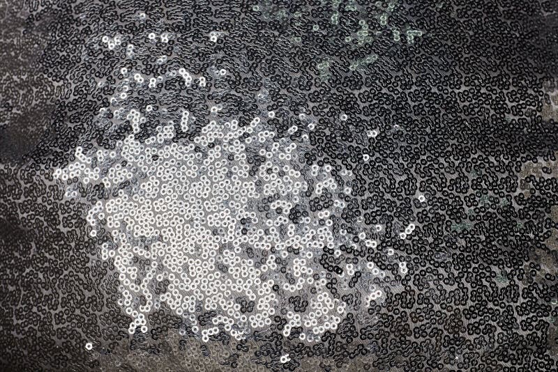 Tygtextur med försilvrar att moussera paljetter fotografering för bildbyråer Tygtextur med försilvrar att moussera paljetter fotografering för bildbyråer