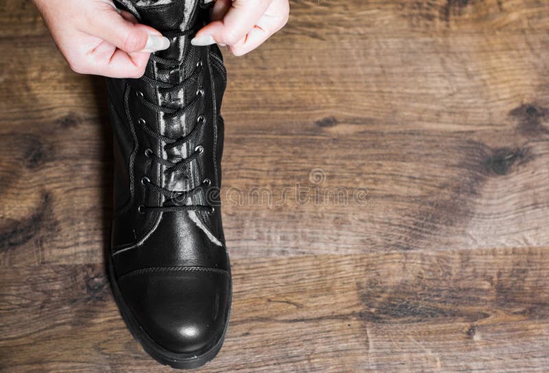 Leather Boots Shoes on the Brown Wooden Table Background.with Copy ...