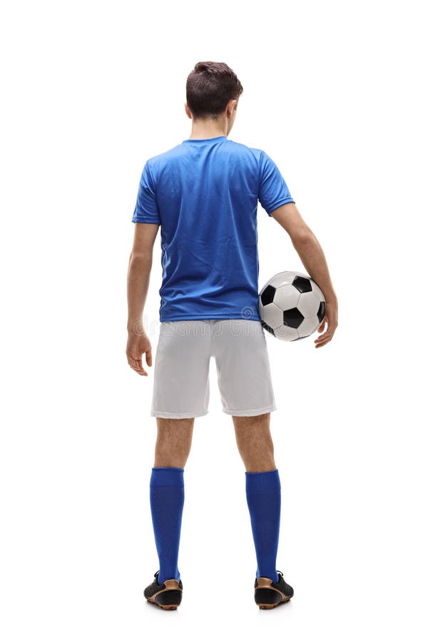 Tylni widok strzelający nastoletni gracz futbolu fotografia stock Tylni widok strzelający nastoletni gracz futbolu fotografia stock