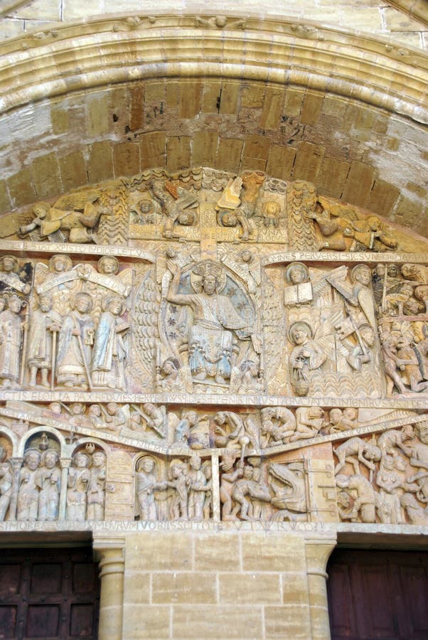 Tympanum carvings of the Last Judgment from the 13th century, Abbey Church of St. Foy, Conques, France. Medieval tympanum stock images, royalty-free photos and pictures