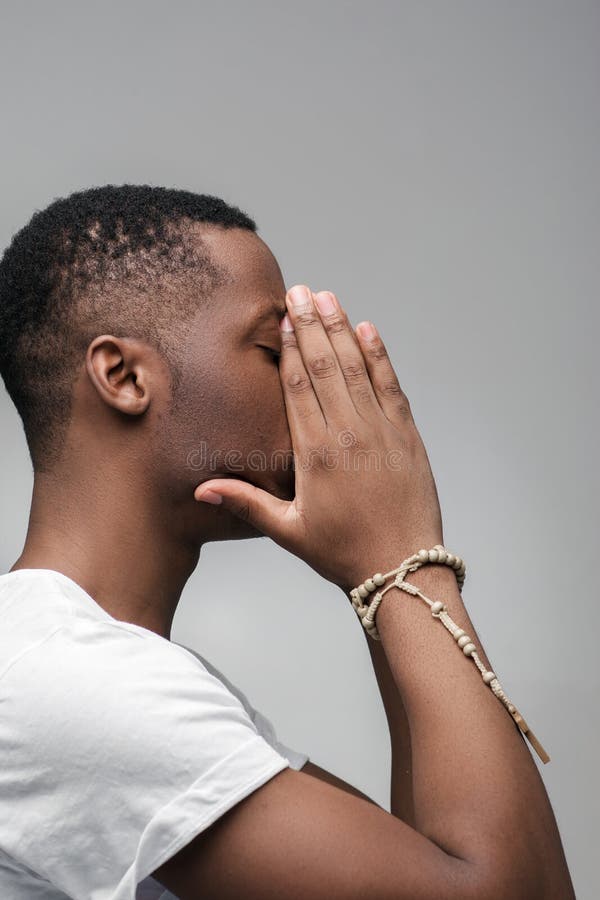 Disappointed african american man feels frustrated. Failed hopes, crushed dreams, bad luck, breaking down. Grey background with free space for text. Disappointed african american man feels frustrated. Failed hopes, crushed dreams, bad luck, breaking down. Grey background with free space for text.