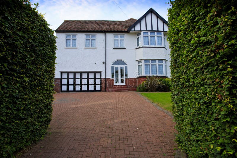 Typical 1930s White Detatched House With Driveway Royalty 