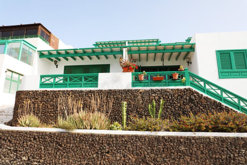 Typical Canarian house for tourists in Playa Blanca beach, Lanzarote, Canary Islands, Spain stock images Typical Canarian house for tourists in Playa Blanca beach, Lanzarote, Canary Islands, Spain stock images