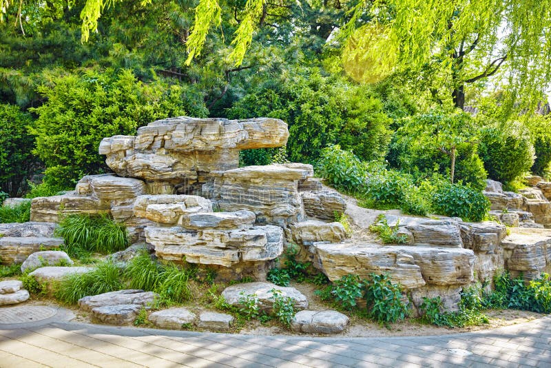 Typical Chinese Garden, Park with Bizarre Rocks. Beijing. Stock Image