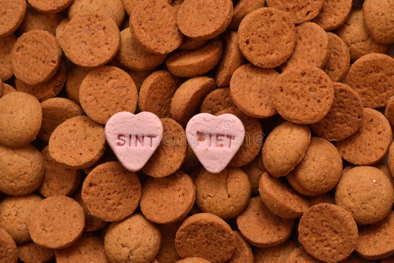 typical dutch ginger nuts candy also known as pepernoten or kruidnoten with Piet and Sint Candy