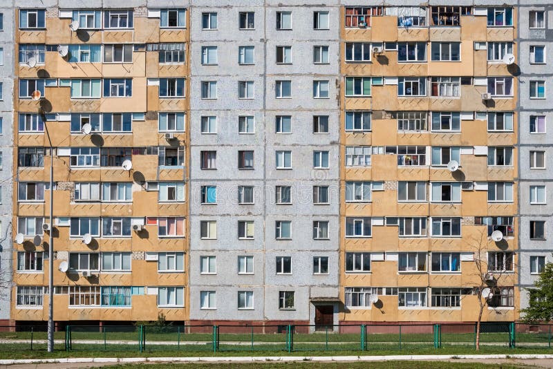 Facade of a Grey Multi-storey Soviet Panel Building Stock Image - Image ...