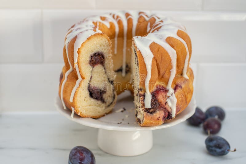 Typical German Poppy Seed Plum Gugelhupf Cake on a Table Stock Photo
