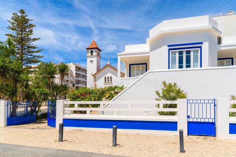 Typical holiday apartments and church tower