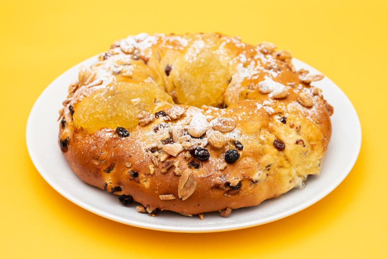 Typical Portuguese Fruit Cake Bolo Rainha on White Dish Stock