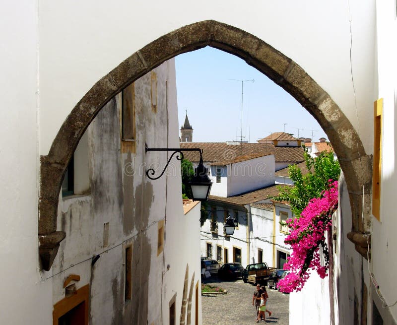 Typical street of the city of situated Évora in the South of Portugal, capital of the Alentejo region considered património cultural of the humanity for UNESCO. Typical street of the city of situated Évora in the South of Portugal, capital of the Alentejo region considered património cultural of the humanity for UNESCO.