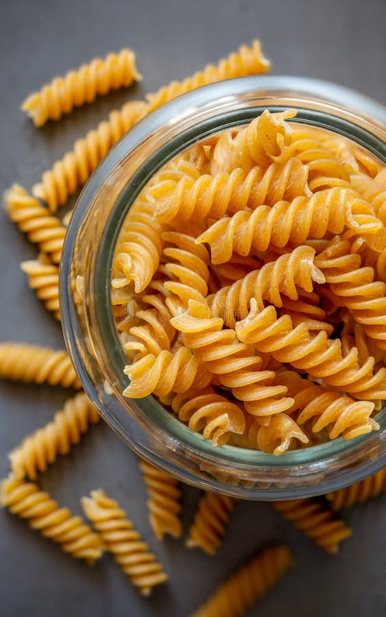 Wholemeal Raw Fusilli Pasta Stock Photo - Image of carbohydrate, brown ...
