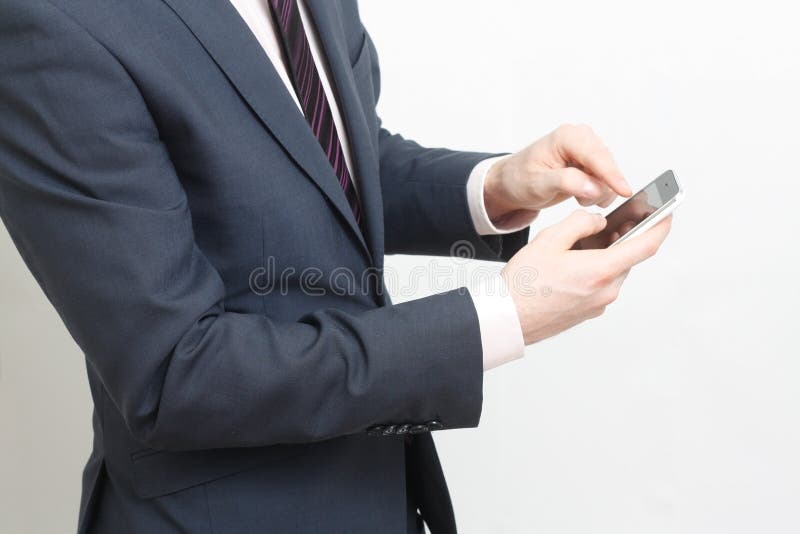 Typing on cell phone royalty free stock image