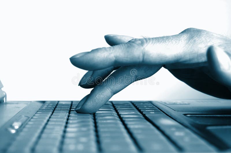 Typing hands on keyboard stock photo