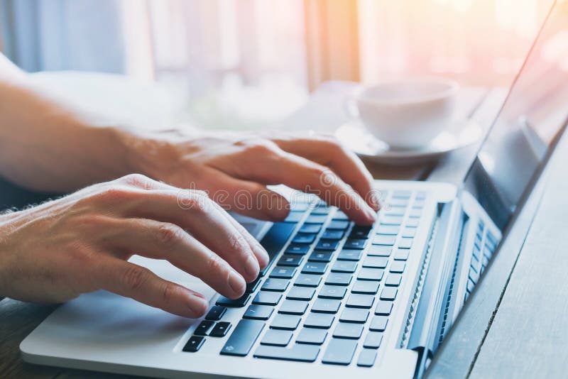 Typing on keyboard, close up of hands of business person working on computer royalty free stock photography