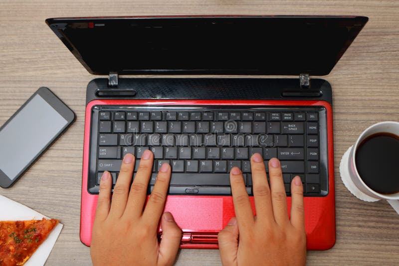 Typing on Laptop Top View royalty free stock image