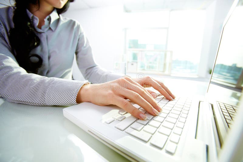 Typing at office stock photos