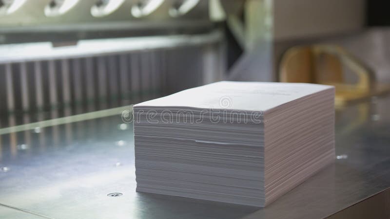 Typography - stack of paper near cutting machine royalty free stock photos Typography - stack of paper near cutting machine royalty free stock photos