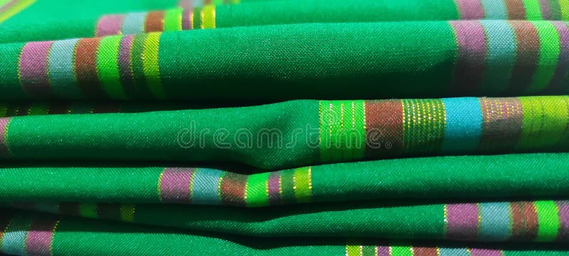 Typowy zielony indonezyjski malajski sarong, któremu towarzyszą złote nici fotografia stock