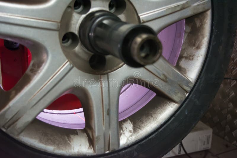 Tyre on the Balancing Machine Prepared for Balancing at the Tyre Stock