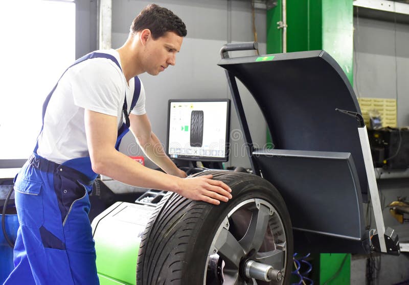 Tyre Change in a Garage Closeup Tyre Tread Stack Tyres for S Stock