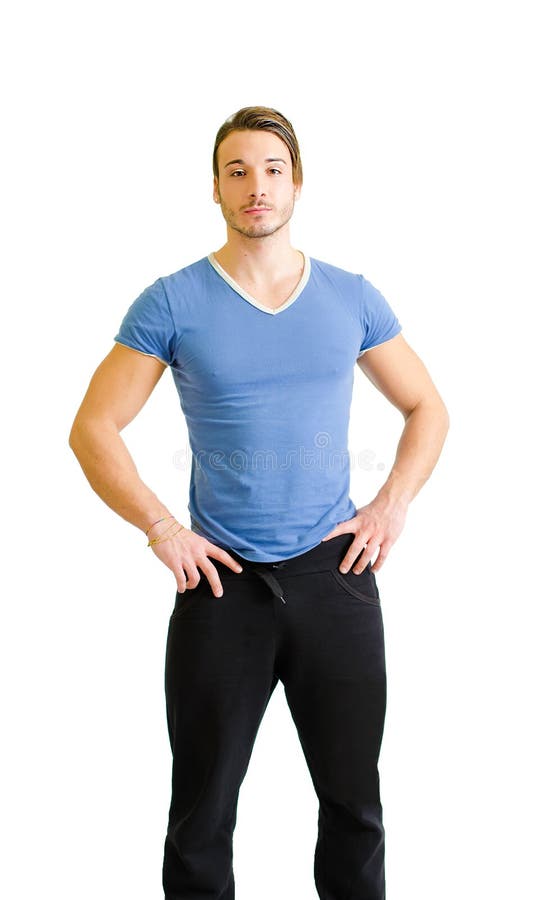 Tânăr chipeș, construcție musculară în picioare pe alb royalty free stock image