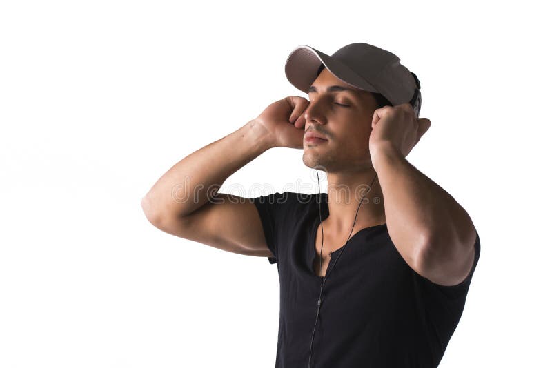Tânăr cu căști ascultând muzică royalty free stock images