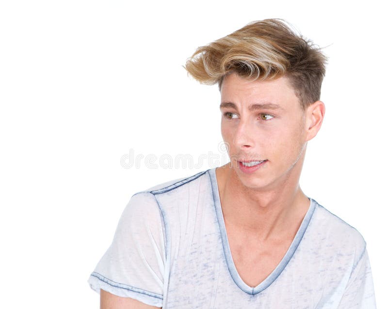 Tânăr fermecător care se uită departe stock images