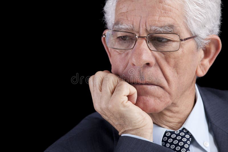 Tänka för affärsmanpensionär arkivbild