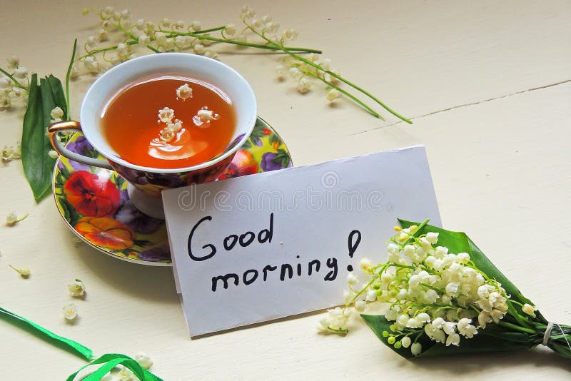 Tè e mughetti fotografia stock libera da diritti