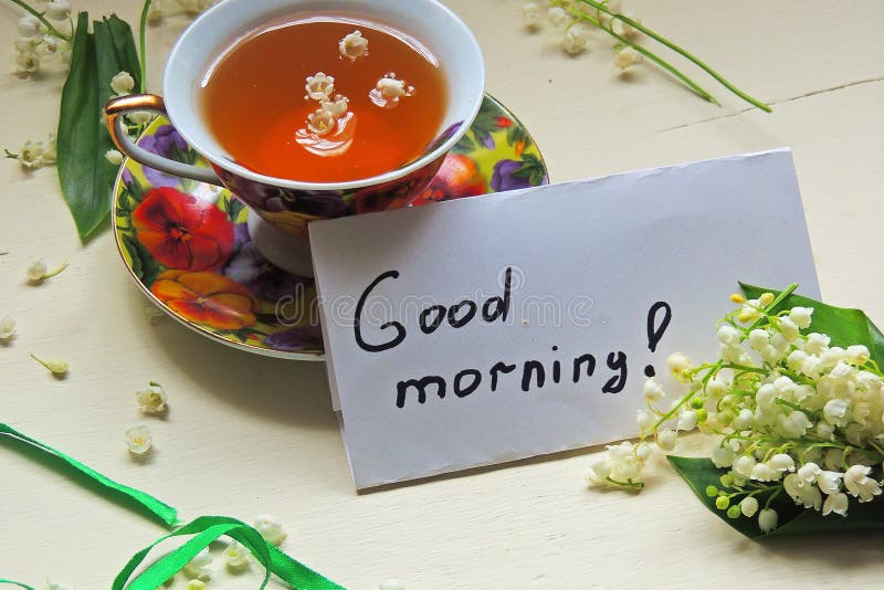 Tè e mughetti fotografia stock libera da diritti