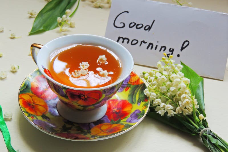 Tè e mughetti immagine stock