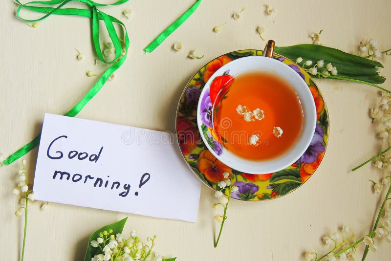 Tè e mughetti fotografia stock libera da diritti