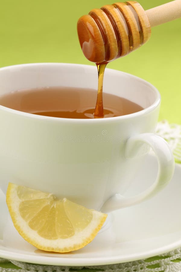 Té de la miel con el limón imagen de archivo Té de la miel con el limón imagen de archivo