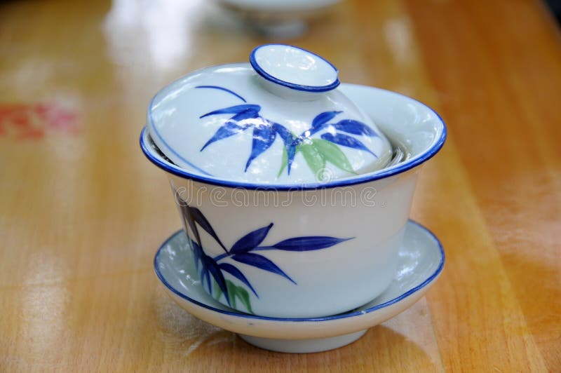 The traditional Chinese cup tea is widely used in tea garden of public park or traditional tea house especially in south west of China, like Sichuan Chengdu. The set of cups consist of a lid, a bowl and a tray which are all made of china. When you drink, normally you should take off the lid and hold the tray to send the bowl to your mouth. Don't just take up the bowl off the tray. The traditional Chinese cup tea is widely used in tea garden of public park or traditional tea house especially in south west of China, like Sichuan Chengdu. The set of cups consist of a lid, a bowl and a tray which are all made of china. When you drink, normally you should take off the lid and hold the tray to send the bowl to your mouth. Don't just take up the bowl off the tray.