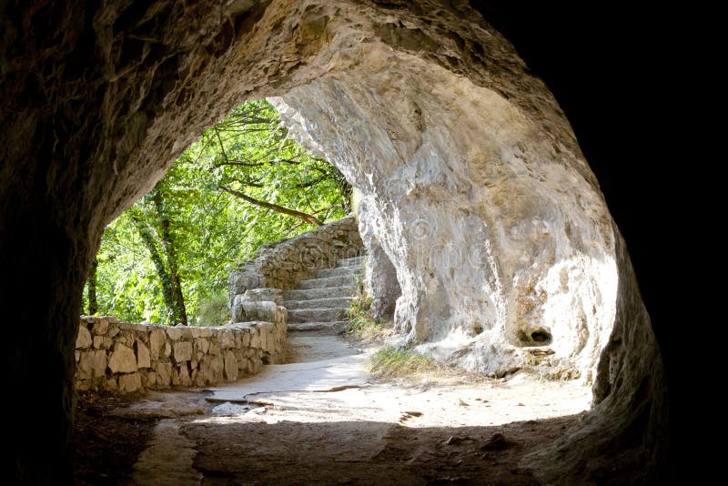 Pathway in stony tunnel. Plitvice lakes - Croatia. Pathway in stony tunnel. Plitvice lakes - Croatia.