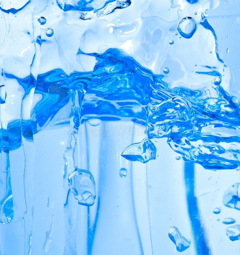 Tła błękitny iskier wody biel