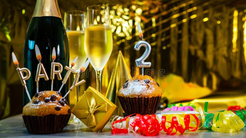Happy birthday background with champagne glasses with number cake 2. Beautiful birthday card with decorations copy space. Happy birthday background with champagne glasses with number cake 2. Beautiful birthday card with decorations copy space.