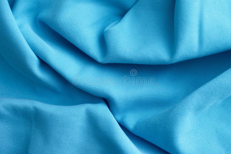 Tło z jasnoniebieską tkaniną kruszoną fotografia royalty free