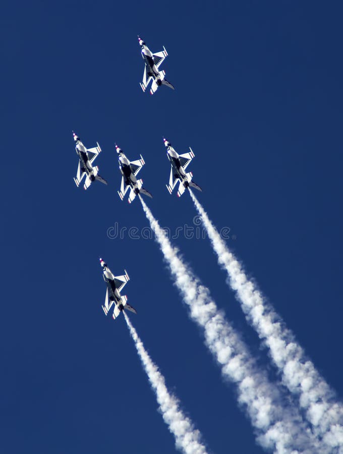 The United States Air Force Thunderbirds Air Demonstration Squadron performs for spectators at Luke Air Force Base in Glendale, Arizona, USA. These highly trained United State Air Force pilots fly in very close high precision aerobatic formations in air shows throughout the United States and around the world. The name Thunderbird is derived from a legendary creature from myths of indigenous North American cultures. The Thunderbirds fly specially marked F-16's. The F-16 (Fighting Falcon) is a very prominent and successful jet fighter aircraft developed by General Dynamics and Lockheed Martin of the United States. Designed as a lightweight fighter, it has evolved to being a highly successful multirole aircraft. In addition to air demonstrations, the USAF Thunderbirds are part of the Air Force combat forces and a component of the 57th Wing. If needed, the team's personnel and aircraft can be rapidly integrated into a fighter unit at their home base Nellis Air Force Base, Nevada. The United States Air Force Thunderbirds Air Demonstration Squadron performs for spectators at Luke Air Force Base in Glendale, Arizona, USA. These highly trained United State Air Force pilots fly in very close high precision aerobatic formations in air shows throughout the United States and around the world. The name Thunderbird is derived from a legendary creature from myths of indigenous North American cultures. The Thunderbirds fly specially marked F-16's. The F-16 (Fighting Falcon) is a very prominent and successful jet fighter aircraft developed by General Dynamics and Lockheed Martin of the United States. Designed as a lightweight fighter, it has evolved to being a highly successful multirole aircraft. In addition to air demonstrations, the USAF Thunderbirds are part of the Air Force combat forces and a component of the 57th Wing. If needed, the team's personnel and aircraft can be rapidly integrated into a fighter unit at their home base Nellis Air Force Base, Nevada.