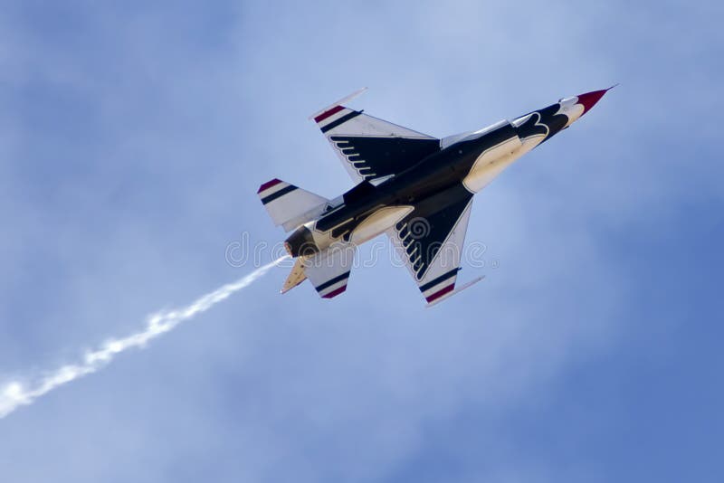 The United States Air Force Thunderbirds Air Demonstration Squadron performs for spectators at Luke Air Force Base in Glendale, Arizona, USA. These highly trained United State Air Force pilots fly in very close high precision aerobatic formations in air shows throughout the United States and around the world. The name Thunderbird is derived from a legendary creature from myths of indigenous North American cultures. The Thunderbirds fly specially marked F-16's. The F-16 (Fighting Falcon) is a very prominent and successful jet fighter aircraft developed by General Dynamics and Lockheed Martin of the United States. Designed as a lightweight fighter, it has evolved to being a highly successful multirole aircraft. In addition to air demonstrations, the USAF Thunderbirds are part of the Air Force combat forces and a component of the 57th Wing. If needed, the team's personnel and aircraft can be rapidly integrated into a fighter unit at their home base Nellis Air Force Base, Nevada. The United States Air Force Thunderbirds Air Demonstration Squadron performs for spectators at Luke Air Force Base in Glendale, Arizona, USA. These highly trained United State Air Force pilots fly in very close high precision aerobatic formations in air shows throughout the United States and around the world. The name Thunderbird is derived from a legendary creature from myths of indigenous North American cultures. The Thunderbirds fly specially marked F-16's. The F-16 (Fighting Falcon) is a very prominent and successful jet fighter aircraft developed by General Dynamics and Lockheed Martin of the United States. Designed as a lightweight fighter, it has evolved to being a highly successful multirole aircraft. In addition to air demonstrations, the USAF Thunderbirds are part of the Air Force combat forces and a component of the 57th Wing. If needed, the team's personnel and aircraft can be rapidly integrated into a fighter unit at their home base Nellis Air Force Base, Nevada.